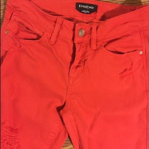 Bebe ripped jeans orange new size 25